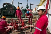 A Chinese man working on an oil rig in South Sudan. China has invested heavily in Sudan's oil industry. Image credit: Svenn Torfinn - Panos