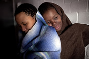 SOUTH AFRICA Cape TownNatasha (right) and her friend Toni share a flat together in Cape town. They are street-based sex workers, and have been working in the industry for four years.Credit: Nikki Rixon / Twenty Ten / Panos