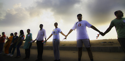 Human Chain formed at Marina Beach, Chennai for 'India against Corruption'. India Against Corruption (IAC) is a people's movement to demand comprehensive reforms of anti-corruption systems in India. Several eminent citizens have come together to force the Government of India to enact the Jan Lokpal Bill. This initiative is supported by several eminent citizens of India including religious leaders, Right To Information Activists, social reformers and bureaucrats. Credit: Kannan B. (CC BY-NC-ND 2.0) Flickr