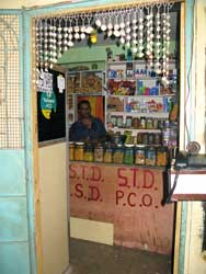 Changing economies: As residents complain about the lack of elevators to reach the higher floors, entrepreneurial residents have set up informal shops on the upper floors of government provided tenement blocks in Mumbai. Photo credit: JaideepGupte