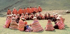 AR teaser Peruvian group sitting in circle on the ground Peruvian group sitting in circle on the ground