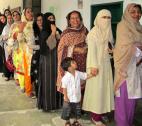 Women queueing to vote in Pakistan Women queueing to vote in Pakistan. Credit - tbc