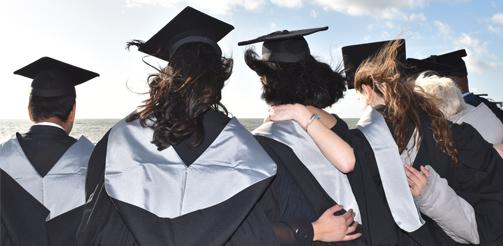 graduating by the sea