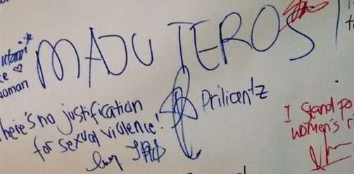 Caption: participants gave their signatures as a sign to support the “#MulaiBicara” or “start to speak up!” campaign to eliminate violence against women. I wrote “maju terus!” which means “keep on going!”