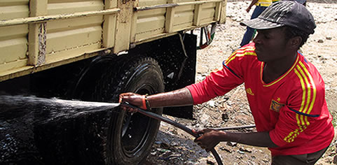 Getto Green, a community-based group within one of Nairobi's slums, run a car wash to provide employment for local youths. Getto Green are a partner of the 