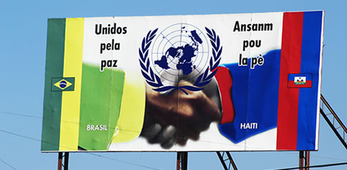 A billboard proclaiming 'United for Peace' which promotes the cooperation between the Haitian population and the Brazilian UN peacekeeping force, the Minustah. Credit: Dieter Telemans / Panos