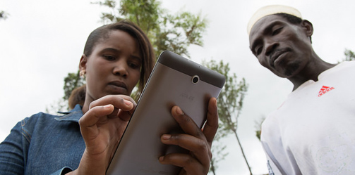 Agricultural extension officer Sia Minja collecting data for farmer baseline studies using CIAT technologies. Lushuto, Tanzania. Credit: Georgina Smith / CIAT. For more information contact g dot smith [at]cgiar.org. Flickr (CC BY-NC-SA 2.0)