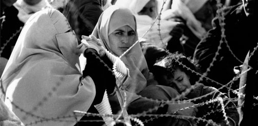 SRAEL (PALESTINE) Gaza Strip. Palestinian women waiting to visit relatives inside Ansar Two prison.