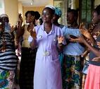 Health bulletin cover image Student midwife and her patients in Bombali District, Sierra Leone.