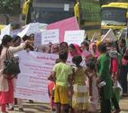 India protests against rape Local women hold signs in protest against the rape and murder of a domestic worker in India.