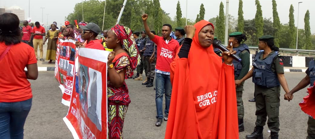 ring Back Our Girls marcher with megaphone