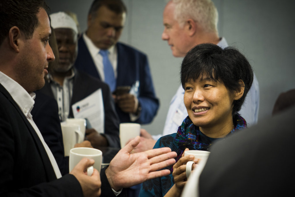 Delegates chatting during a break at the Forum on Freedom of Religion or Belief and Inclusive Development