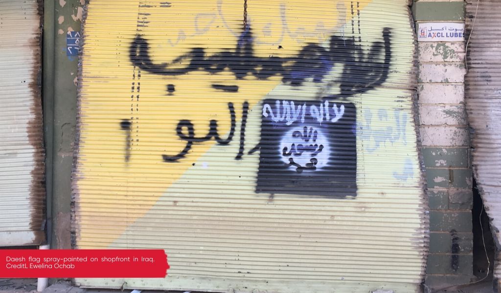 Daesh flag painted on shopfront in Iraq