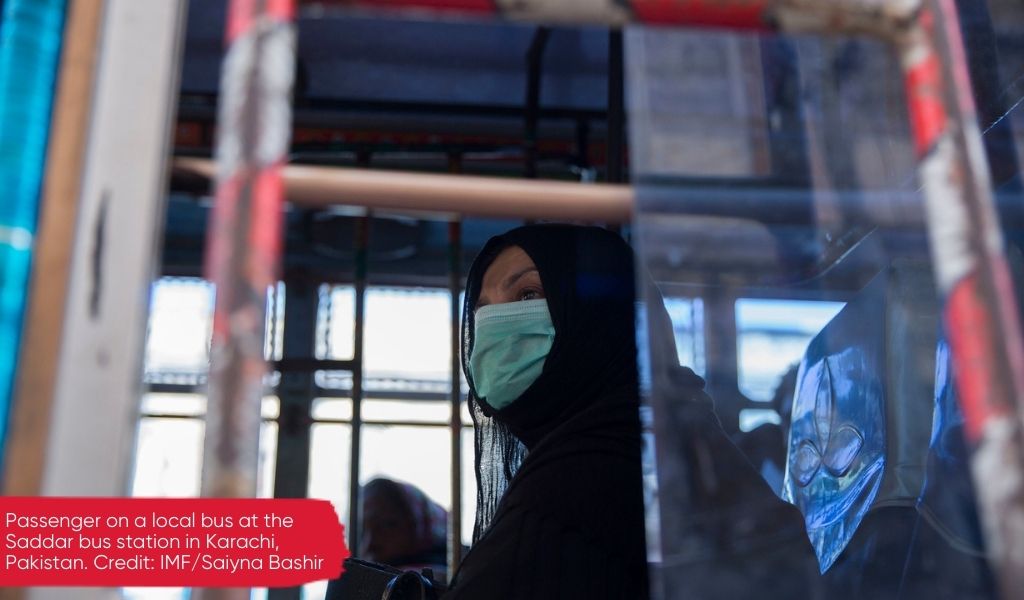 Passenger on a local bus in Karachi, Pakistan