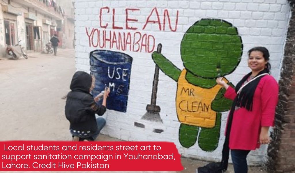 Students and residents create street art to support sanitation campaign in Youhanabad, Lahore