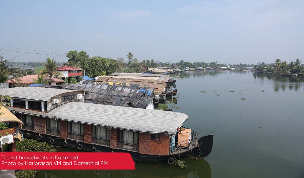 Tourist houseboats in a river in Kuttanad, Kerala