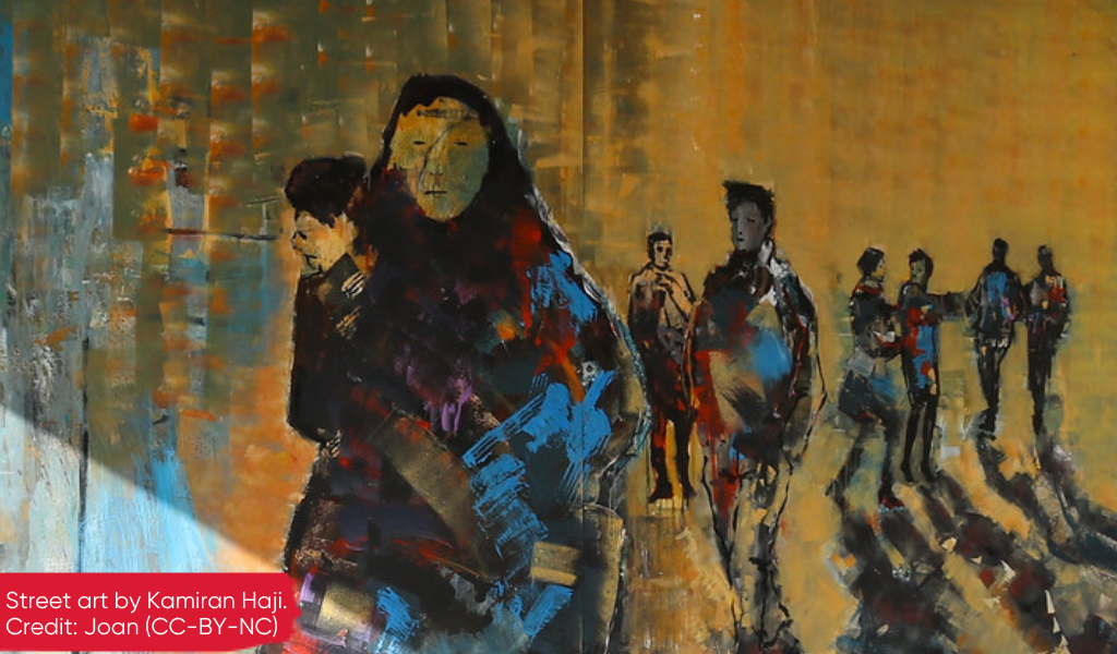 Street art depicting a woman and child refugee with figures of men in the background