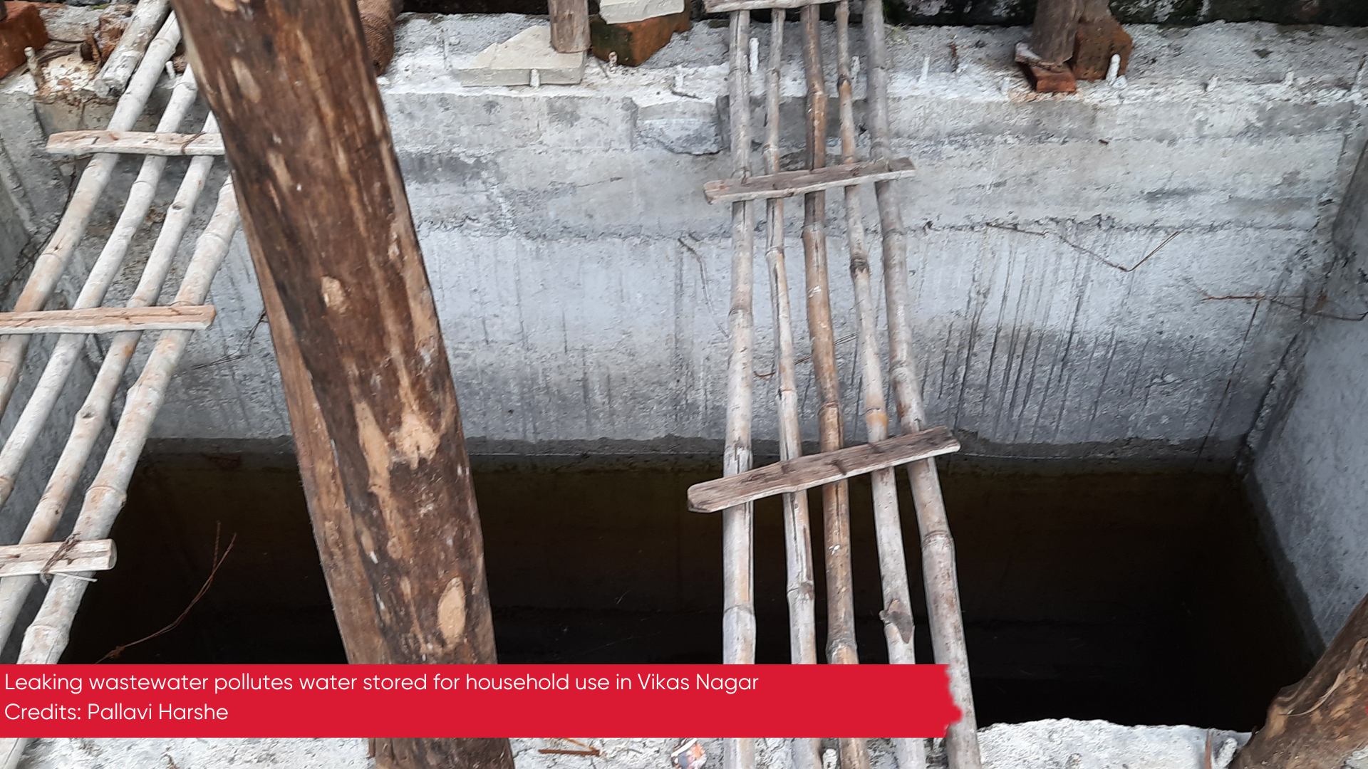 Leaking wastewater from a nearby septic tank pollutes water stored by a neighbour for household non-drinking use in Vikas Nagar