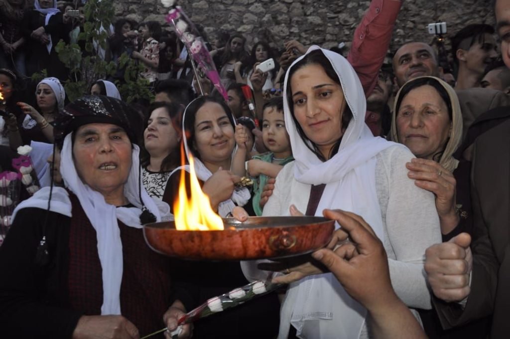 The celebration of the New Year among the Yazidis which includes the picking of red flowers at spring and ceremony includes singing joyful heritage songs. Image taken 13th April 2021. Credit: Darman Rosho Khalaf from the village of Ba’azra, Duhok.