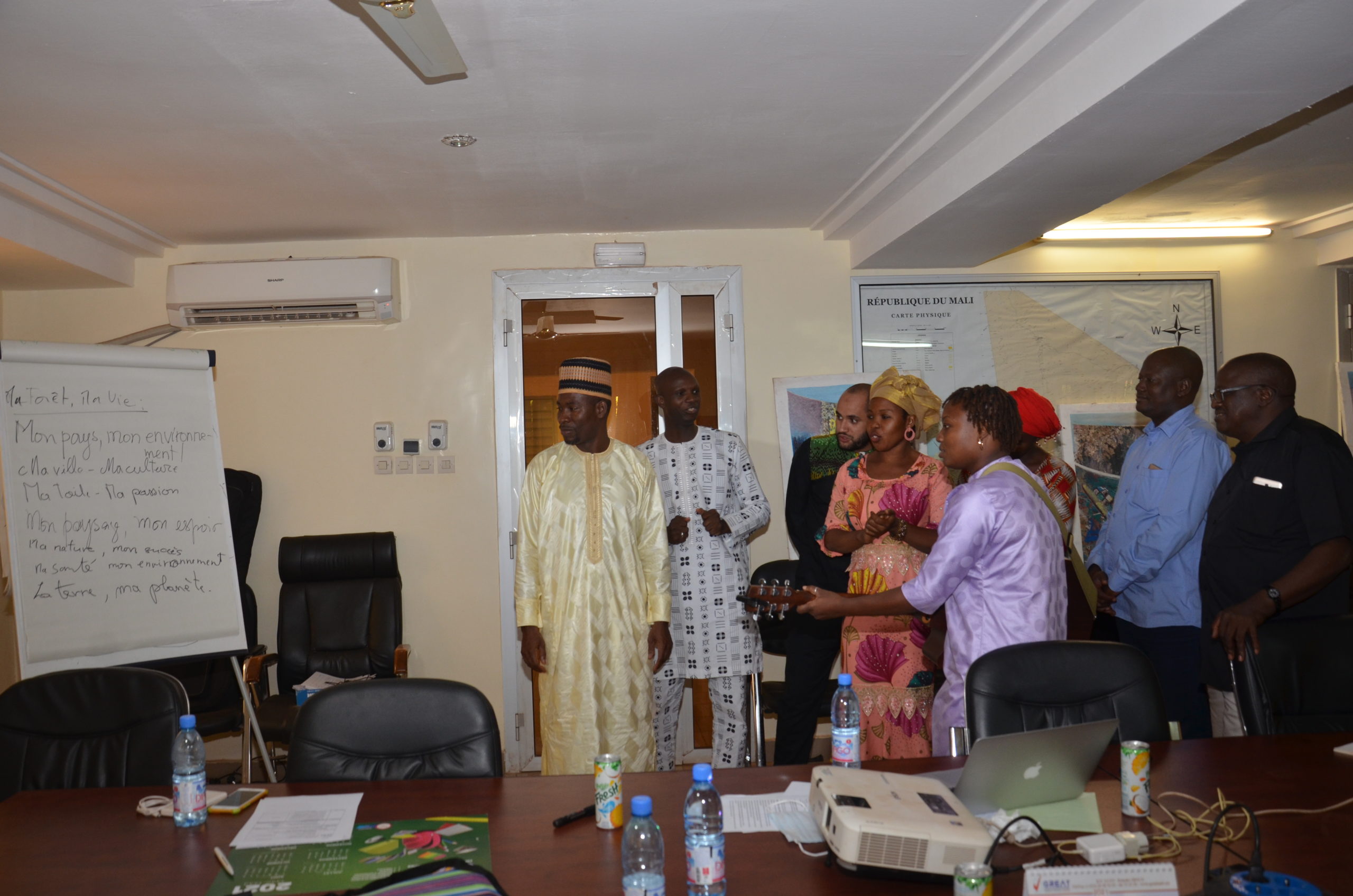 workshop members singing the song in Mali
