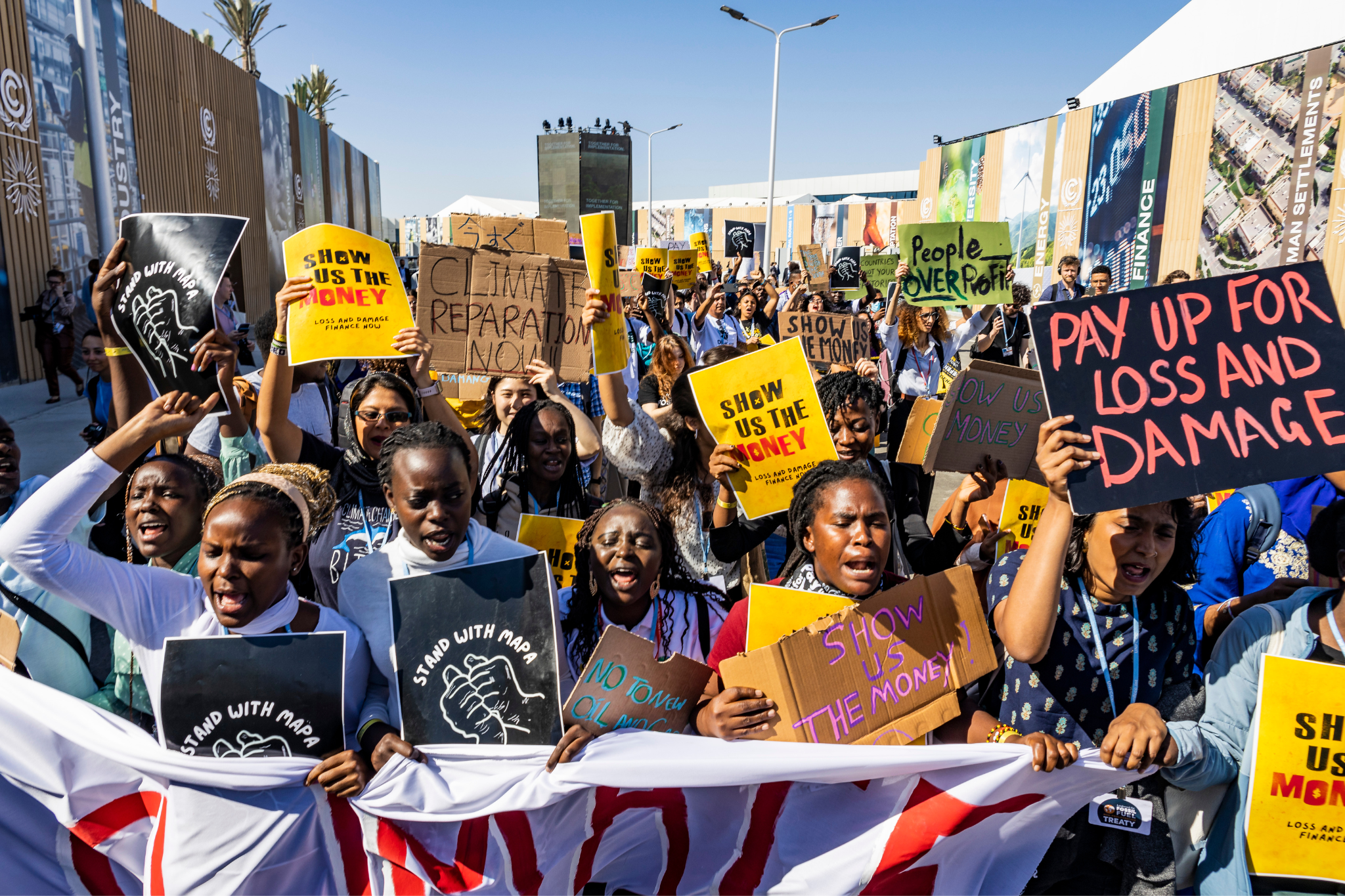 Protestors demand loss and damage funding and reparations at COP27 in Egypt