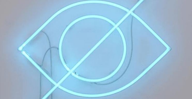 A neon eye shape with a line crossing through it.