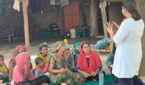 Women in rural gujrat speaking to a researcher