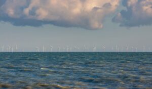 Wind turbines by the ocean