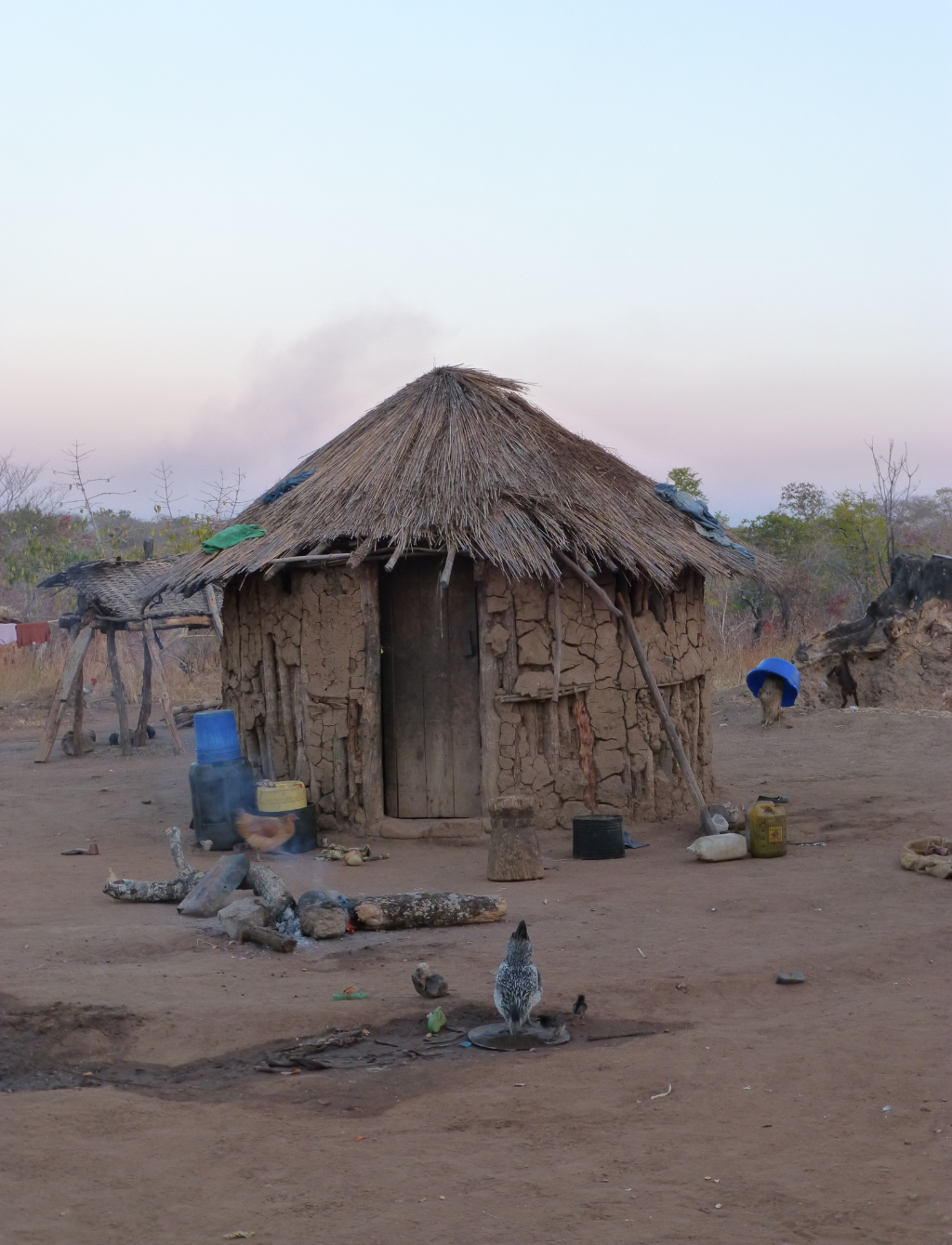 A hut with a straw roof.