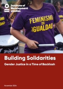 IDS logo top left, placed over a large image of a woman drumming. Below the image, a red box with white text which says Building Solidarities Gender Justice in a Time of Backlash