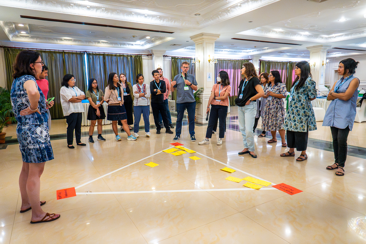 Participants of the short course, Participatory monitoring, evaluation, and learning taking part in a group activity. 