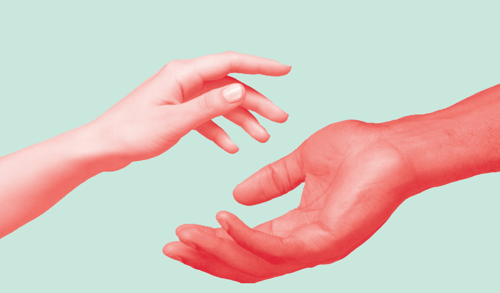 An image of two hands about to touch each other.